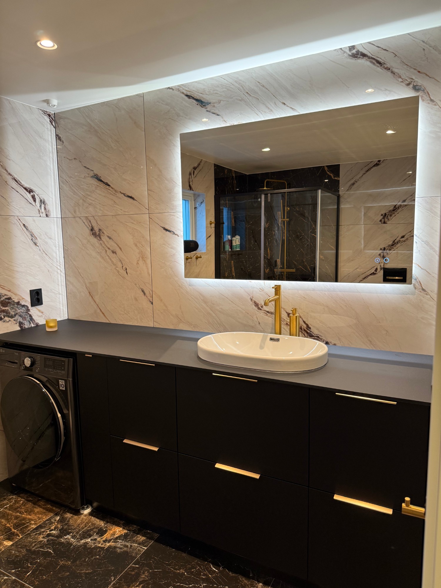 Marble bathroom with washing machine