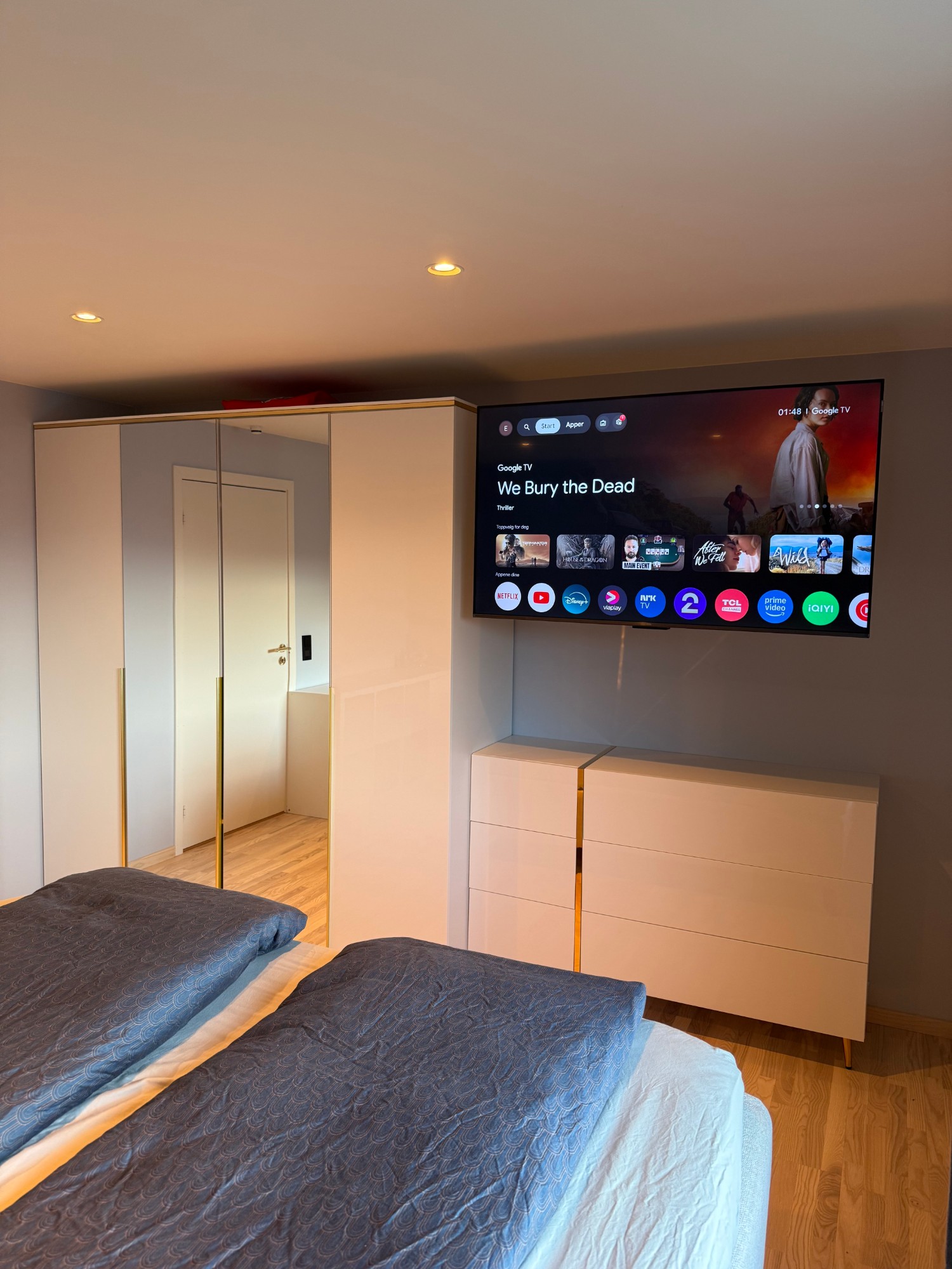 Master bedroom with wardrobe and TV