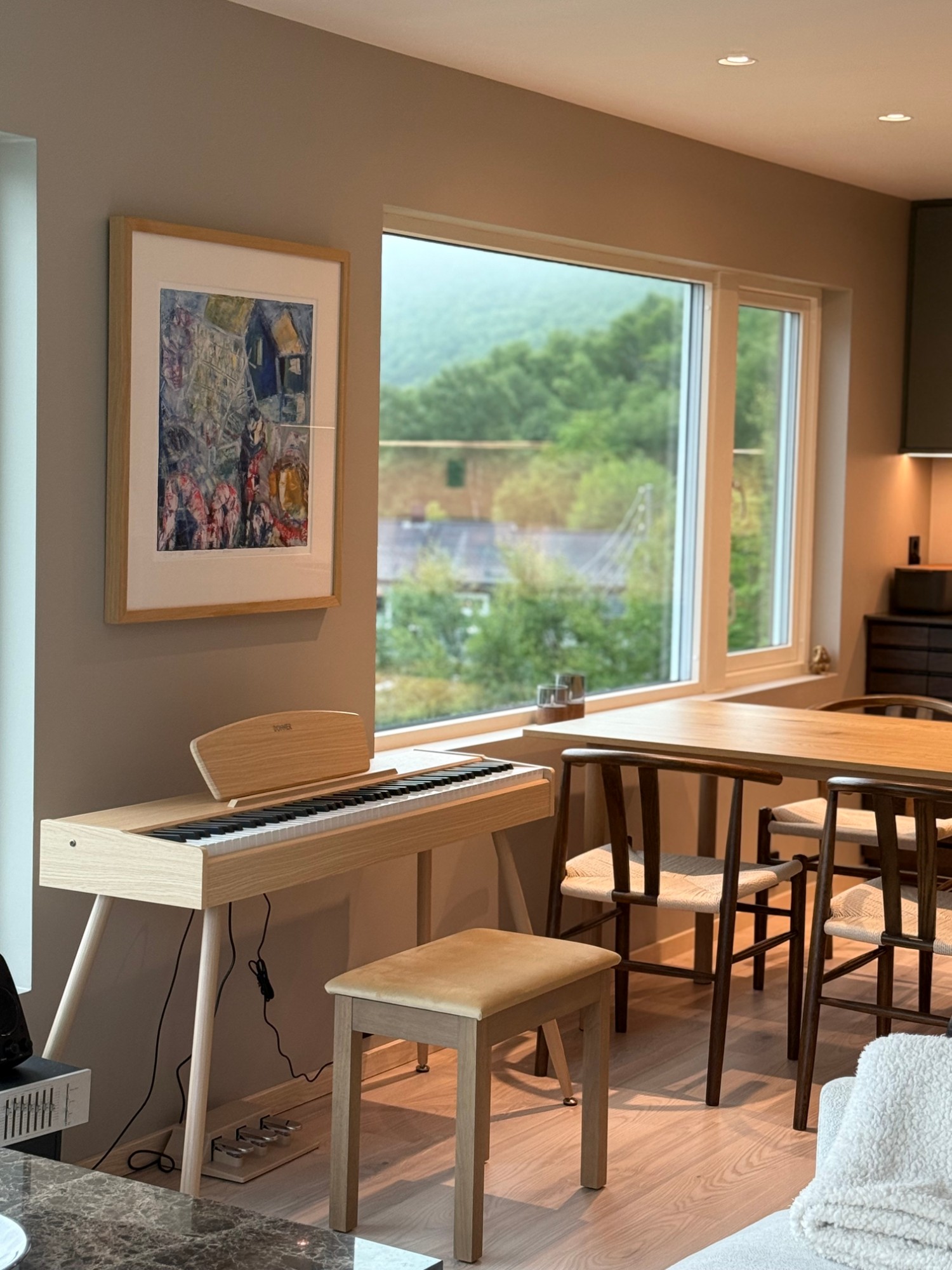 Piano corner by the window